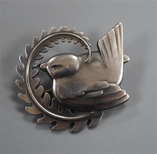 An Arno Malinowski for Georg Jensen sterling robin on a fearn frond brooch, no. 309, 5cm.